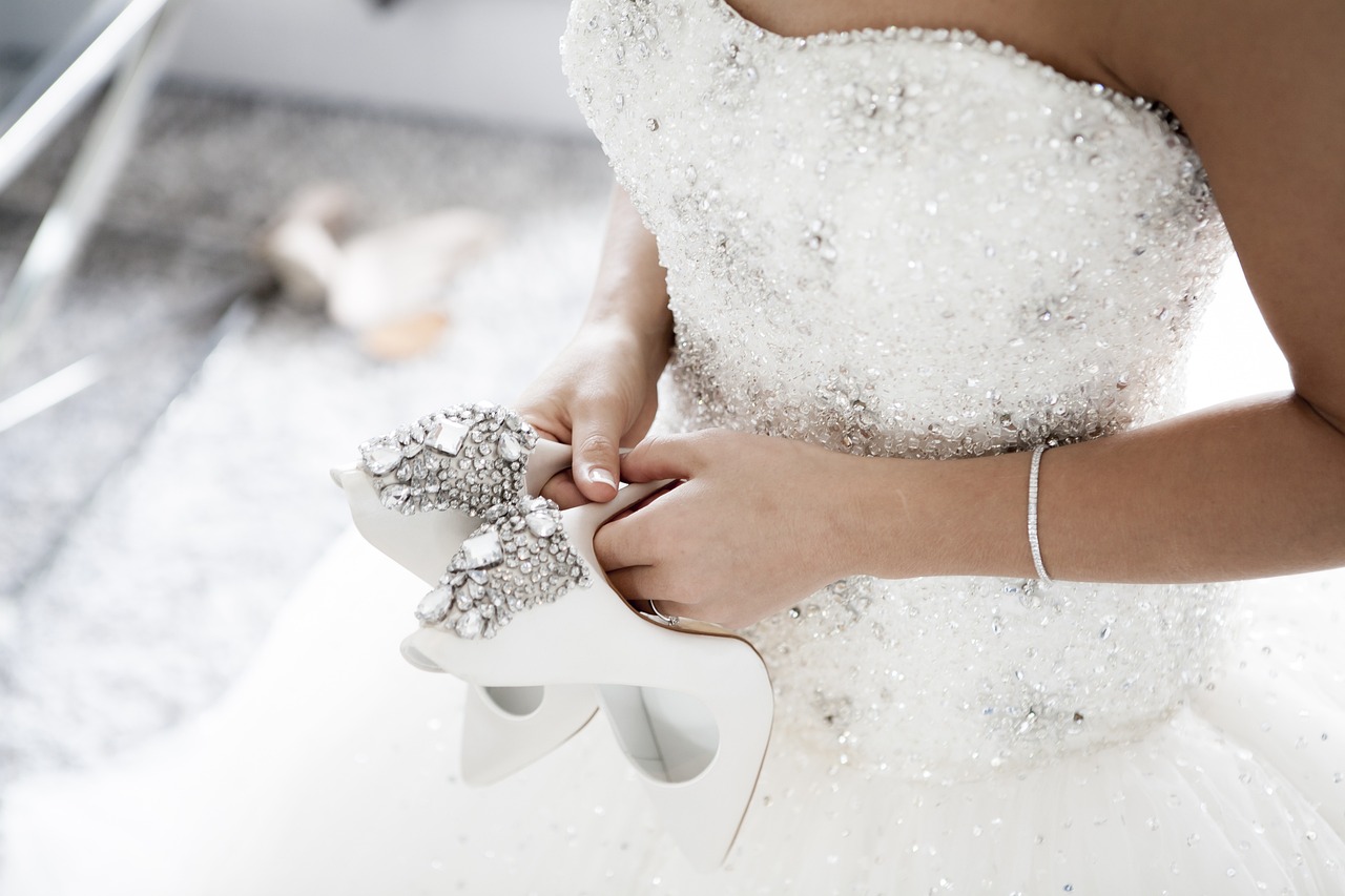 wedding gown and heels with diamonds